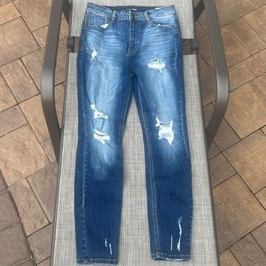Distressed washed out skinny jeans